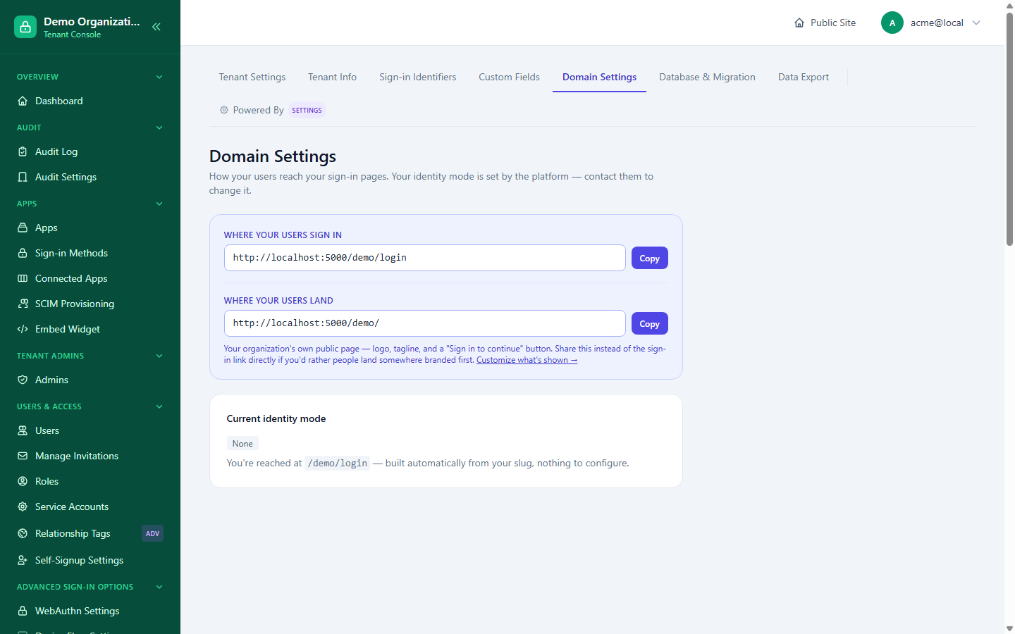 The Domain Settings page for a tenant on the default "None" identity mode, showing the sign-in and landing URLs with copy buttons
